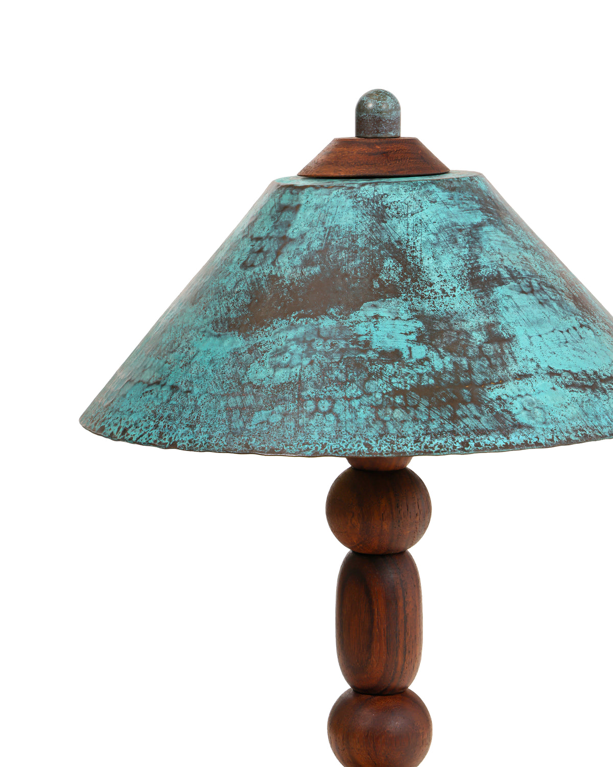 Close-up of hand-applied verdigris patina on the brass shade of Totem II