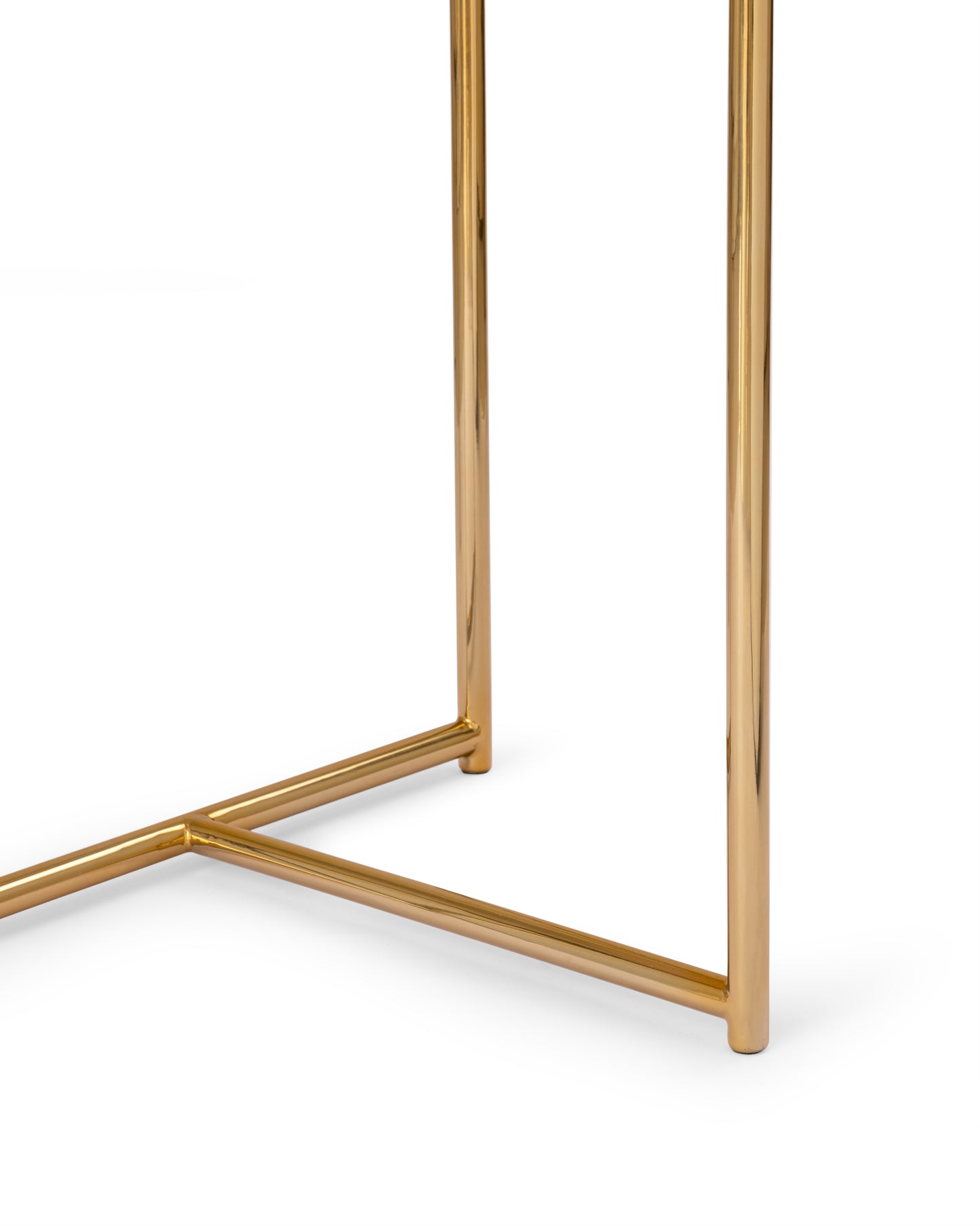 Close-up of the Tri Metal side table's polished metal legs and triangular base stretcher